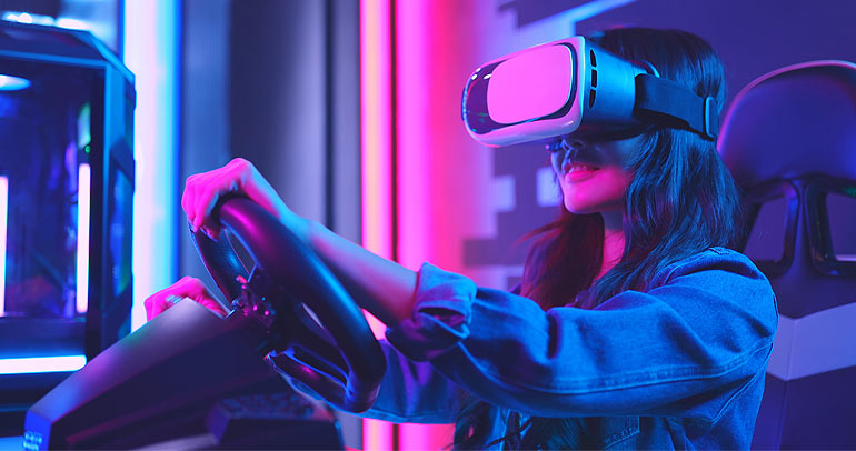 A woman immersed in an AI technology-generated driving simulation exercise