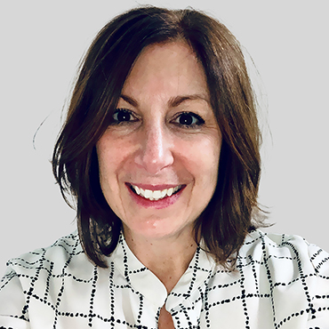 An image of Kim LeConey, insights director with the Consumer Goods & Retail practice at Escalent